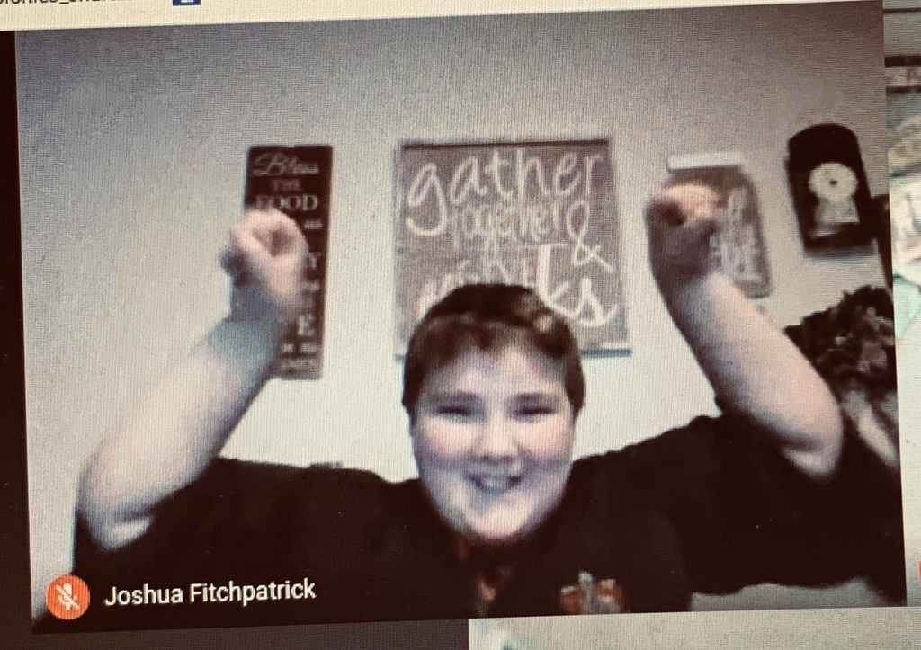 Joshua Fitchpatrick does his victory dance after he escaped the digital escape room.