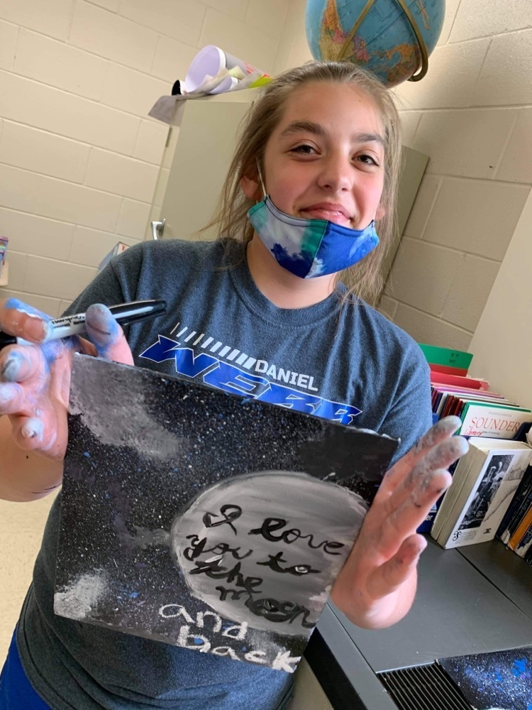 Nataleigh Webb and her painting.