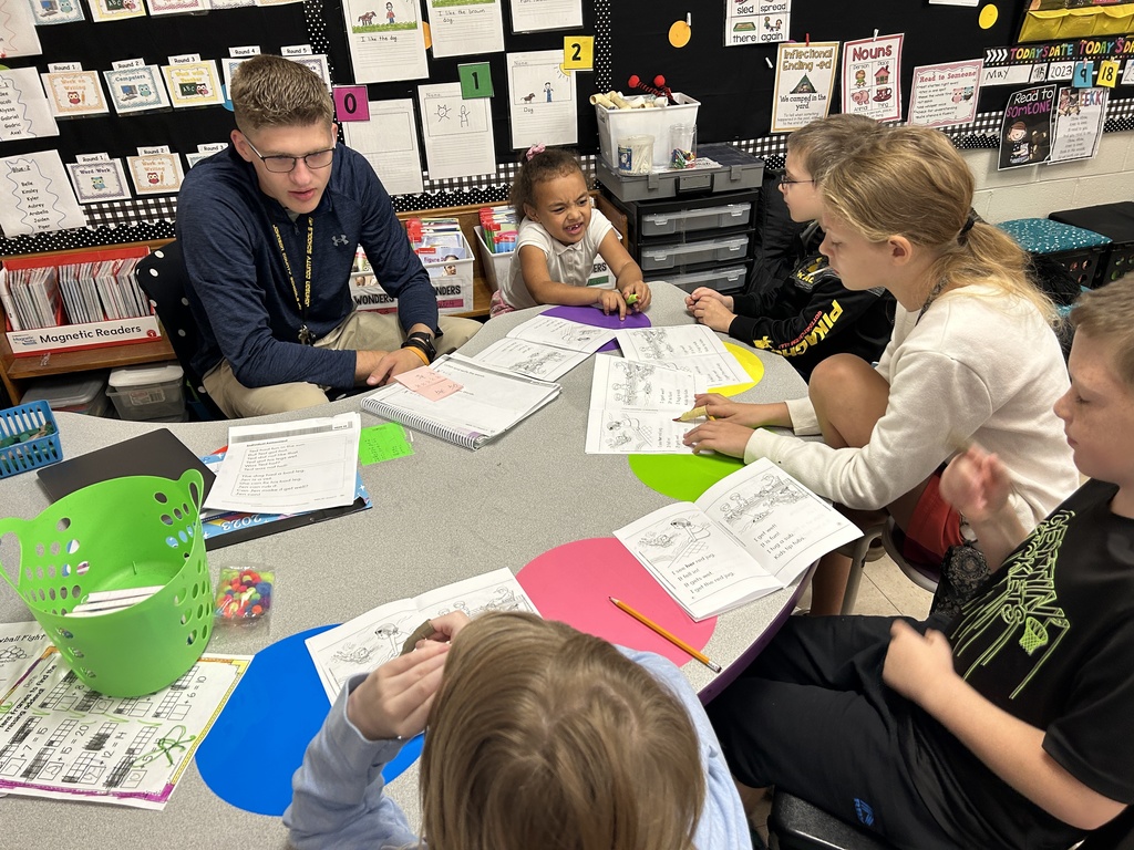Mr. Trimble working with a group